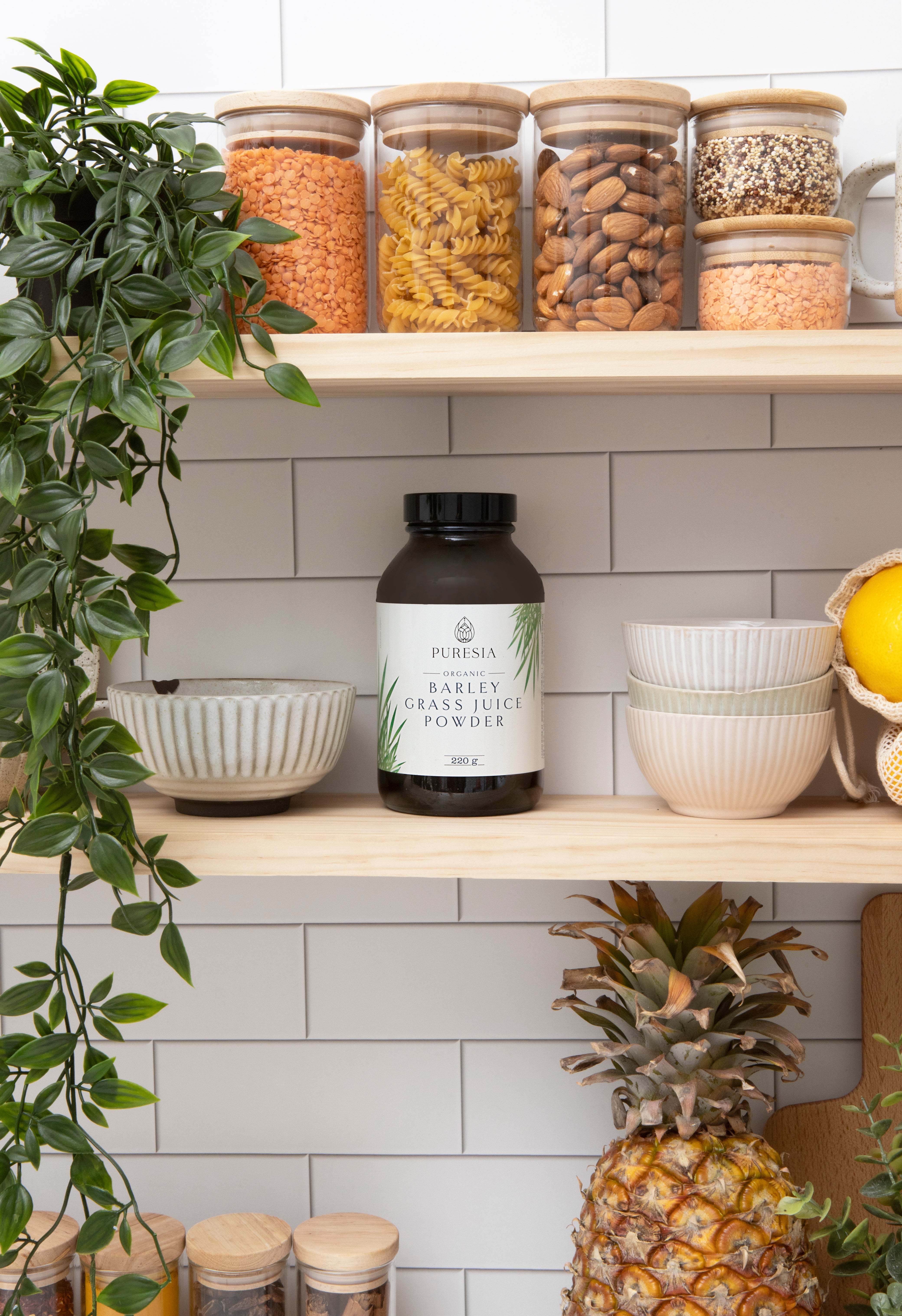 Bottle of barley grass juice powder in a pantry